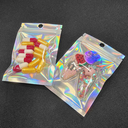 Smell Proof Bags & Resealable Foil Pouch Bag [100 PCS ] Great for Party Favor Food Storage (Holographic Color, 8 x 5.5 Inch) - Royalty’s Flame